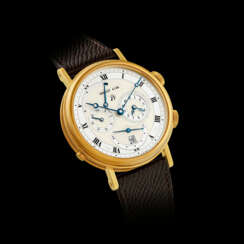 BREGUET. AN 18K GOLD AUTOMATIC ALARM WRISTWATCH WITH ALARM ON/OFF INDICATOR, ALARM POWER RESERVE INDICATOR, DUAL TIME AND DATE