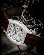 Keramik. CARTIER. A RARE 18K WHITE GOLD TONNEAU-SHAPED AUTOMATIC PERPETUAL CALENDAR WRISTWATCHWITH LEAP YEAR INDICATION