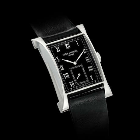 PATEK PHILIPPE. A VERY RARE AND ATTRACTIVE PLATINUM LIMITED EDITION RECTANGULAR WRISTWATCH, MADE TO COMMEMORATE THE INAUGURATION OF PATEK PHILIPPE’S NEW WATCHMAKING CENTRE IN 1997 - photo 1