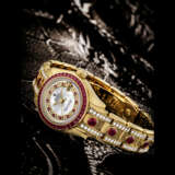 ROLEX. A LADY`S ATTRACTIVE AND VERY RARE 18K GOLD, DIAMOND AND RUBY-SET AUTOMATIC WRISTWATCH WITH SWEEP CENTRE SECONDS, DATE, BRACELET AND MOTHER-OF-PEARL DIAL - фото 1