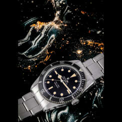 ROLEX. A STAINLESS STEEL AUTOMATIC WRISTWATCH WITH SWEEP CENTRE SECONDS AND BRACELET