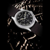 PATEK PHILIPPE. A PLATINUM AUTOMATIC ANNUAL CALENDAR WRISTWATCH WITH SWEEP CENTRE SECONDS AND 24 HOUR INDICATION - фото 1