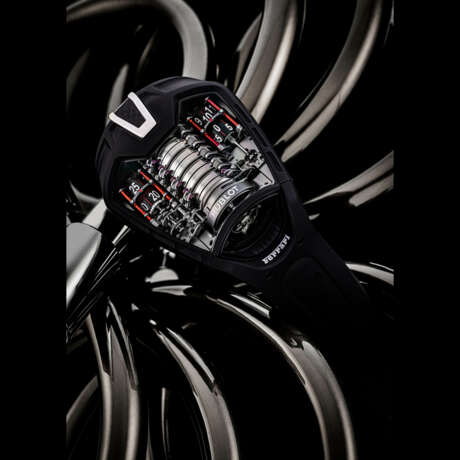 HUBLOT. AN IMPRESSIVE AND RARE BLACK PVD-COATED TITANIUM LIMITED EDITION SKELETONISED VERTICAL TOURBILLON WRISTWATCH WITH 50-DAY POWER RESERVE INDICATOR - фото 1