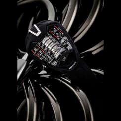 HUBLOT. AN IMPRESSIVE AND RARE BLACK PVD-COATED TITANIUM LIMITED EDITION SKELETONISED VERTICAL TOURBILLON WRISTWATCH WITH 50-DAY POWER RESERVE INDICATOR