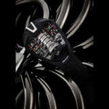 HUBLOT. AN IMPRESSIVE AND RARE BLACK PVD-COATED TITANIUM LIMITED EDITION SKELETONISED VERTICAL TOURBILLON WRISTWATCH WITH 50-DAY POWER RESERVE INDICATOR - photo 1