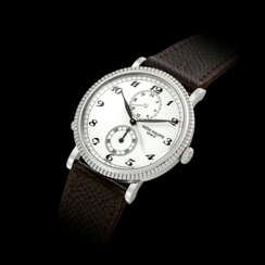 PATEK PHILIPPE. AN 18K WHITE GOLD DUAL TIME WRISTWATCH WITH 24 HOUR INDICATION AND BREGUET NUMERALS