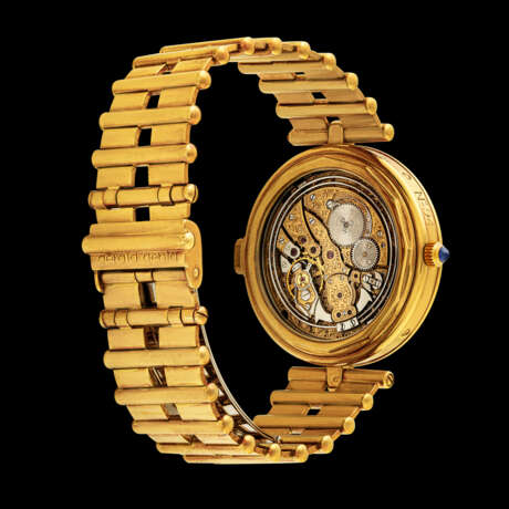 GERALD GENTA. A RARE 18K GOLD MINUTE REPEATING PERPETUAL CALENDAR BRACELET WATCH WITH MOON PHASES AND LEAP YEAR INDICATION - photo 2