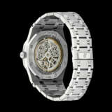 AUDEMARS PIGUET. A RARE AND ATTRACTIVE STAINLESS STEEL, PLATINUM AND DIAMOND-SET SEMI-SKELETONISED AUTOMATIC PERPETUAL CALENDAR WRISTWATCH WITH MOON PHASES, LEAP YEAR INDICATION AND BRACELET - photo 2