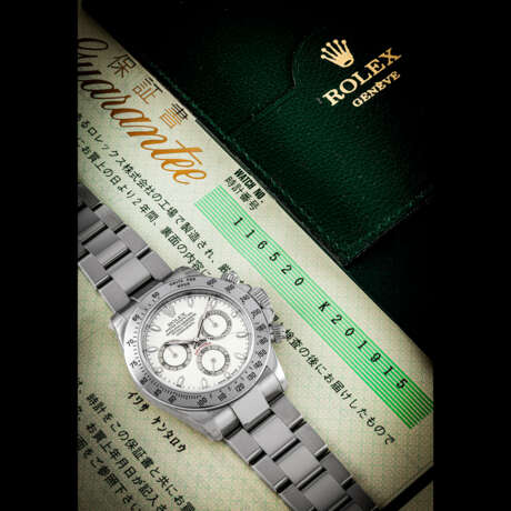 ROLEX. A STAINLESS STEEL AUTOMATIC CHRONOGRAPH WRISTWATCH WITH BRACELET - Foto 1