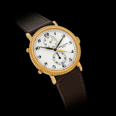 PATEK PHILIPPE. AN 18K GOLD DUAL TIME WRISTWATCH WITH 24 HOUR INDICATION AND BREGUET NUMERALS - photo 1
