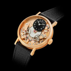 BREGUET. AN 18K PINK GOLD SEMI-SKELETONISED WRISTWATCH WITH POWER RESERVE