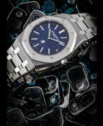 Адемар Пиге. AUDEMARS PIGUET. A RARE PLATINUM AND TITANIUM LIMITED EDITION AUTOMATIC BRACELET WATCH WITH DATE
