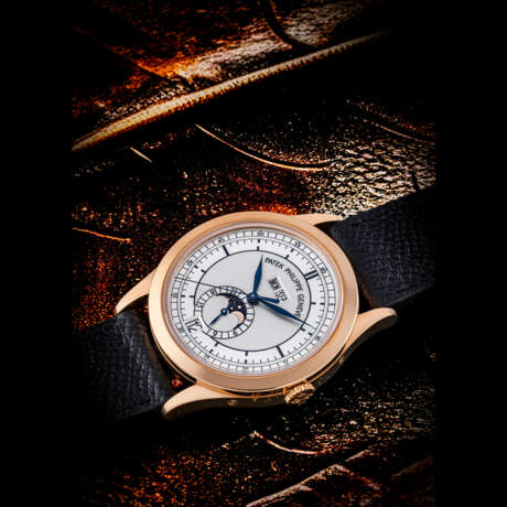 PATEK PHILIPPE. AN 18K PINK GOLD AUTOMATIC ANNUAL CALENDAR WRISTWATCH WITH SWEEP CENTRE SECONDS, MOON PHASES AND 24 HOUR INDICATION - фото 1