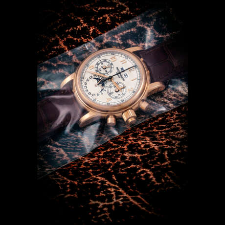 PATEK PHILIPPE. A RARE 18K PINK GOLD PERPETUAL CALENDAR SPLIT SECONDS CHRONOGRAPH WRISTWATCH WITH MOON PHASES, 24 HOUR AND LEAP YEAR INDICATION, SINGLE SEALED - photo 1