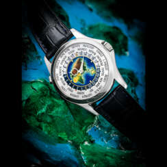 PATEK PHILIPPE. A RARE 18K WHITE GOLD AUTOMATIC WORLD TIME WRISTWATCH WITH CLOISONN&#201; ENAMEL DIAL