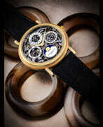 Vacheron Constantin. VACHERON CONSTANTIN. AN 18K GOLD AUTOMATIC SKELETONISED PERPETUAL CALENDAR WRISTWATCH WITH MOON PHASES