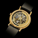 VACHERON CONSTANTIN. AN 18K GOLD AUTOMATIC SKELETONISED PERPETUAL CALENDAR WRISTWATCH WITH MOON PHASES - photo 2