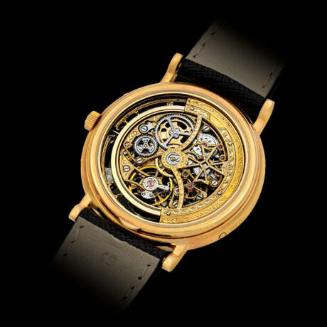 VACHERON CONSTANTIN. AN 18K GOLD AUTOMATIC SKELETONISED PERPETUAL CALENDAR WRISTWATCH WITH MOON PHASES - photo 2