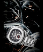 Flyback. PATEK PHILIPPE. AN ATTRACTIVE STAINLESS STEEL AUTOMATIC FLYBACK CHRONOGRAPH WRISTWATCH WITH DATE AND BRACELET