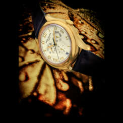 PATEK PHILIPPE. AN 18K GOLD AUTOMATIC ANNUAL CALENDAR WRISTWATCH WITH SWEEP CENTRE SECONDS AND 24 HOUR INDICATION