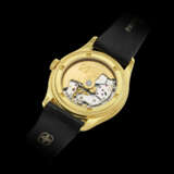 PATEK PHILIPPE. AN 18K GOLD AUTOMATIC ANNUAL CALENDAR WRISTWATCH WITH SWEEP CENTRE SECONDS AND 24 HOUR INDICATION - photo 2