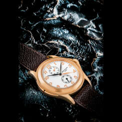 PATEK PHILIPPE. AN 18K PINK GOLD DUAL TIME WRISTWATCH WITH 24 HOUR INDICATION AND BREGUET NUMERALS