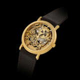 VACHERON CONSTANTIN. AN 18K GOLD SKELETONISED AUTOMATIC WRISTWATCH - Foto 1