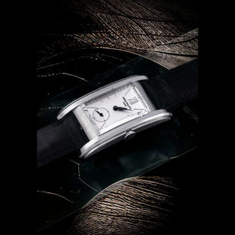 PATEK PHILIPPE. A VERY RARE PLATINUM LIMITED EDITION RECTANGULAR WRISTWATCH, MADE TO COMMEMORATE THE SALON OPENING IN GENEVA IN 2006 - photo 1