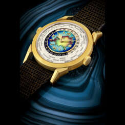 PATEK PHILIPPE. AN EXCEPTIONAL, HIGHLY IMPORTANT AND EXTREMELY RARE 18K GOLD TWO-CROWN WORLD TIME WRISTWATCH WITH 24 HOUR INDICATION AND CLOISONN&#201; ENAMEL DIAL DEPICTING THE EURASIA MAP