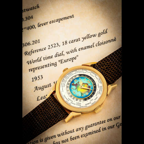 PATEK PHILIPPE. AN EXCEPTIONAL, HIGHLY IMPORTANT AND EXTREMELY RARE 18K GOLD TWO-CROWN WORLD TIME WRISTWATCH WITH 24 HOUR INDICATION AND CLOISONN&#201; ENAMEL DIAL DEPICTING THE EURASIA MAP - photo 7