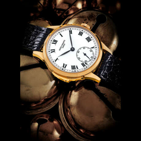 PATEK PHILIPPE. AN EXTREMELY RARE AND ATTRACTIVE 18K GOLD AUTOMATIC MINUTE REPEATING WRISTWATCH WITH CASE MADE BY JEAN-PIERRE HAGMANN, MADE TO CELEBRATE THE 150TH ANNIVERSARY OF PATEK PHILIPPE IN 1989 - Foto 1