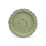 A CARVED AND MOULDED LONGQUAN CELADON BARBED-RIM CUP STAND - photo 1