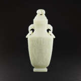 A WHITE JADE ‘ELEPHANT-HANDLE’ VASE AND COVER - photo 1