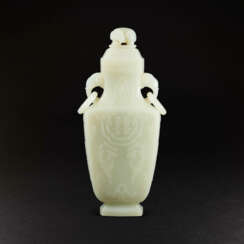 A WHITE JADE ‘ELEPHANT-HANDLE’ VASE AND COVER