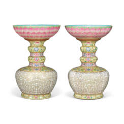 AN EXTREMELY RARE PAIR OF FAMILLE ROSE AND GILT-DECORATED ‘LOTUS’ ALTAR VASES