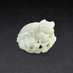A WHITE JADE &#39;QILIN AND BOOK&#39; CARVING