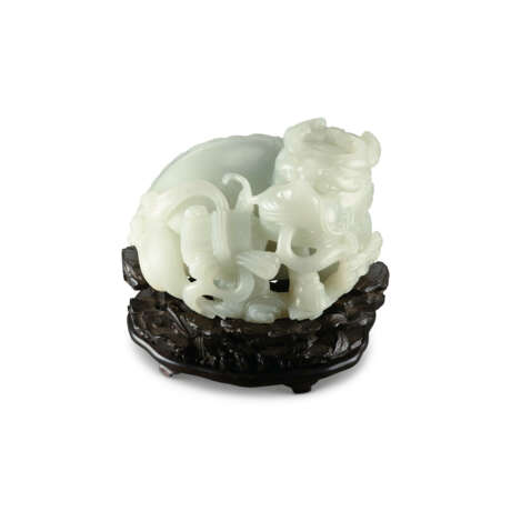 A WHITE JADE `QILIN AND BOOK` CARVING - фото 2