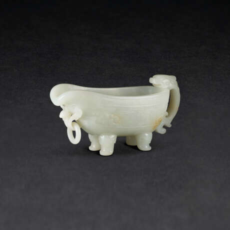 A CARVED WHITE JADE ARCHAISTIC POURING VESSEL, YI - photo 1