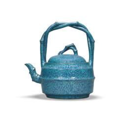 A RARE YIXING ROBIN’S EGG GLAZED TEAPOT AND COVER