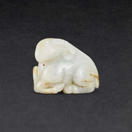 A WHITE JADE CARVING OF A RAM - photo 1
