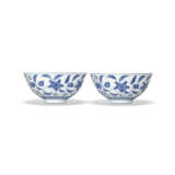 A RARE PAIR OF MING-STYLE BLUE AND WHITE `PALACE` BOWLS - photo 1