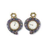 A PAIR OF GILT-METAL PAINTED ENAMEL AND PASTE-INLAID PEACH-FORM WALL CLOCKS - photo 1