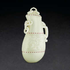 A RUBY-EMBELLISHED WHITE JADE ‘PHOENIX’ GOURD-FORM VASE AND COVER