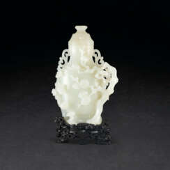 A CARVED WHITE JADE ‘THREE FRIENDS OF WINTER’ VASE AND COVER