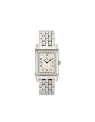 Jaeger-LeCoultre, Reverso, Petite Taille Ref. 265.8.08 | steel wristwatch | Year 1998 | Quartz movement | Silvered dial with arabic numerals | Case n. 1871421 | Cal. 608 | Size mm 21x33 | box and paper