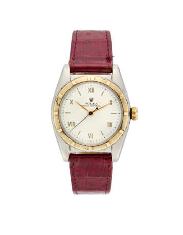Rolex, Oyster Perpetual "Ovetto" Ref. 3372 | steel and gold wristwatch | Year 1954 | Automatic movement | Silvered dial with roman numerals | Case n. 20696 | Movement n. 37375 | Cal. 9 3/4" | Diam. mm 32 - photo 1