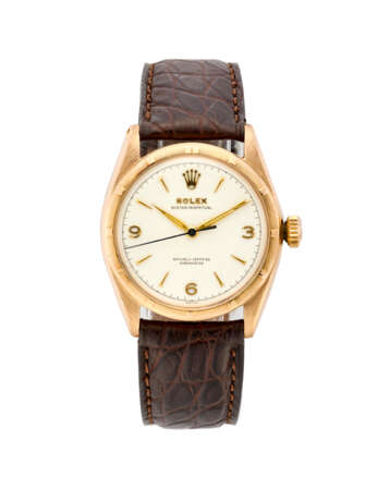 Rolex, Oyster Perpetual "Semi-Ovettone" Ref. 6085 | gold wristwatch | Year 1961 | Automatic movement | Silvered dial with indexes | Case n. 769808 | Movement n. F34585 | Cal. A260 | Diam. mm 34 - photo 1