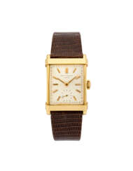 Patek Philippe "Large Chinese" Ref. 2531 | gold wristwatch | Year 1955 | Manual-wind movement | Silvered dial with indexes | Case n. 691680 | Movement n. 976662 | Cal. 9-90 | Size mm 28x32 | with archive extract