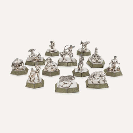 CARTIER SET OF TWELVE SILVER AND SHAGREEN ZODIAC FIGURINES - photo 1
