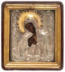 RUSSIAN SILVERED OKLAD ICON IN KIOT SHOWING THE MOURNING MOTHER OF GOD